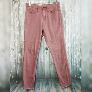 High rise power stretch skinny raw hem jea…